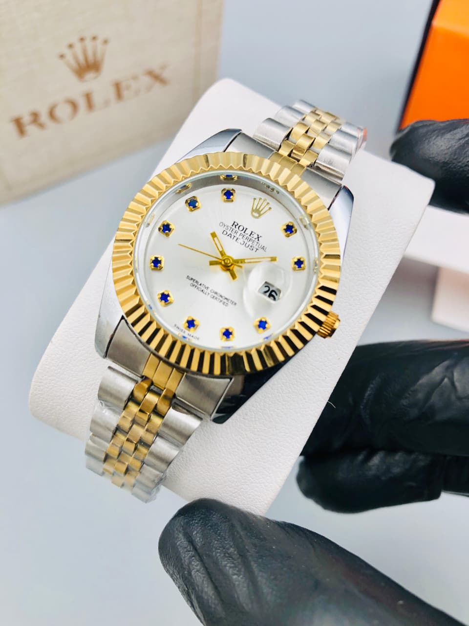 ROLEX silver-golden shaded with mini blue